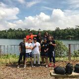 Group photo of people outdoors by a lake, representing client 'durrr', a satisfied PCExperts101 customer.