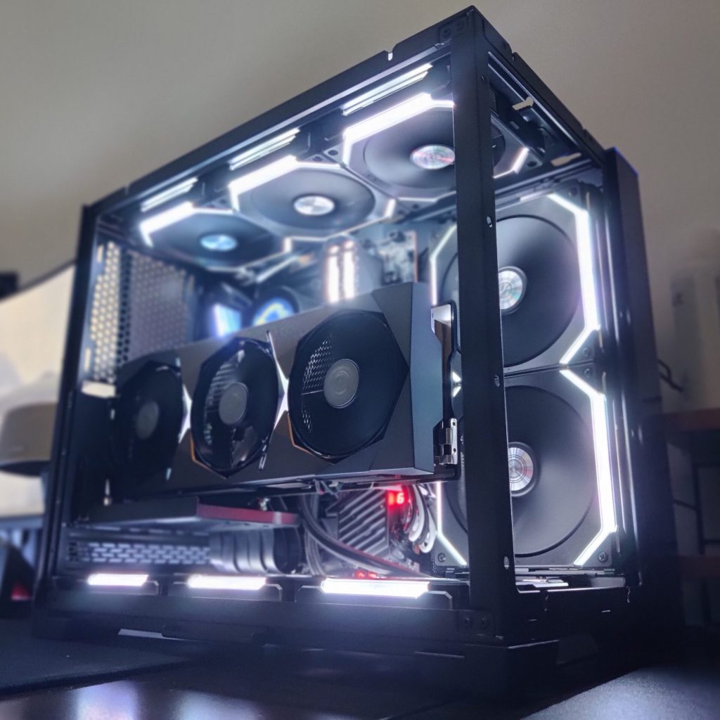 High-end custom PC build by PCExperts101 featuring a vertically mounted graphics card and bright white internal RGB lighting for a clean and striking aesthetic.