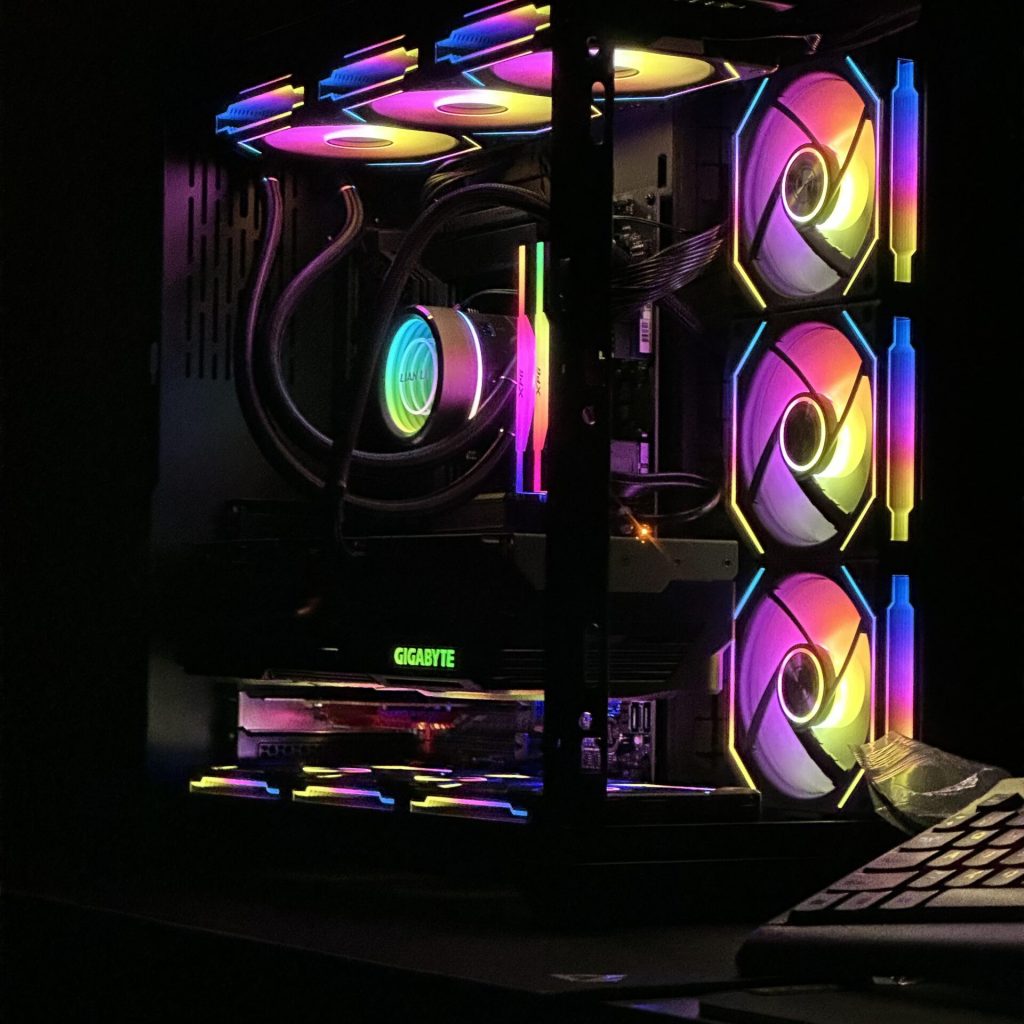 High-performance custom gaming PC by PCExperts101 featuring a Gigabyte graphics card, liquid cooling, and multiple vibrant RGB fans for exceptional visual appeal and cooling.